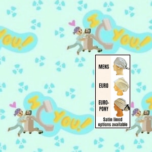 May include: Light blue medical scrub caps with a repeating pattern of cartoon figures and radiation symbols. The image includes examples of "MENS", "EURO", and "EURO-PONY" style caps, with satin-lined options available.