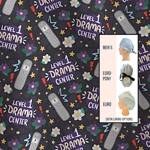 May include: A dark background with a pattern of gray landline phones, purple flowers, yellow stars, and the text "LEVEL 1 DRAMA CENTER." The image also shows three different styles of surgical caps.