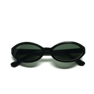 Thin Oval Authentic 1990s Vintage Deadstock Slim Black Frame Sunglasses