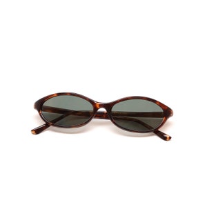 Authentic 1990s Mod Tortoise Oval Narrow Frame Sunglasses