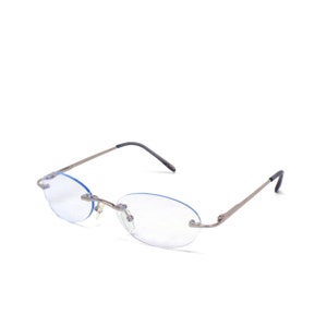 Authentic Vintage 90s Made Light Tint Blue Lens Framless Deadstock Sunglasses