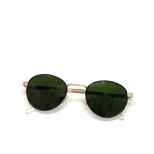 Echte vintage goudgroene zonnebril uit de jaren 90 in cirkelstijl