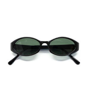 Oval Authentic 1990s Vintage Deadstock Black Frame Sunglasses