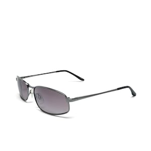 May include: A pair of sunglasses with a thin, dark metallic frame and rectangular lenses. The lenses feature a gradient tint that transitions from a darker shade at the top to a lighter shade at the bottom. The temples are slim with black tips.