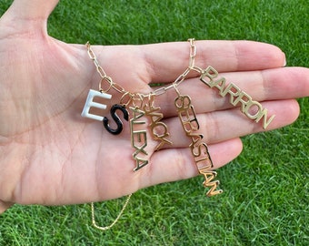 As seen on Esther and Sasha! Personalized Name Charms. Custom Charms. Enamel initial charms. Custom name charms.