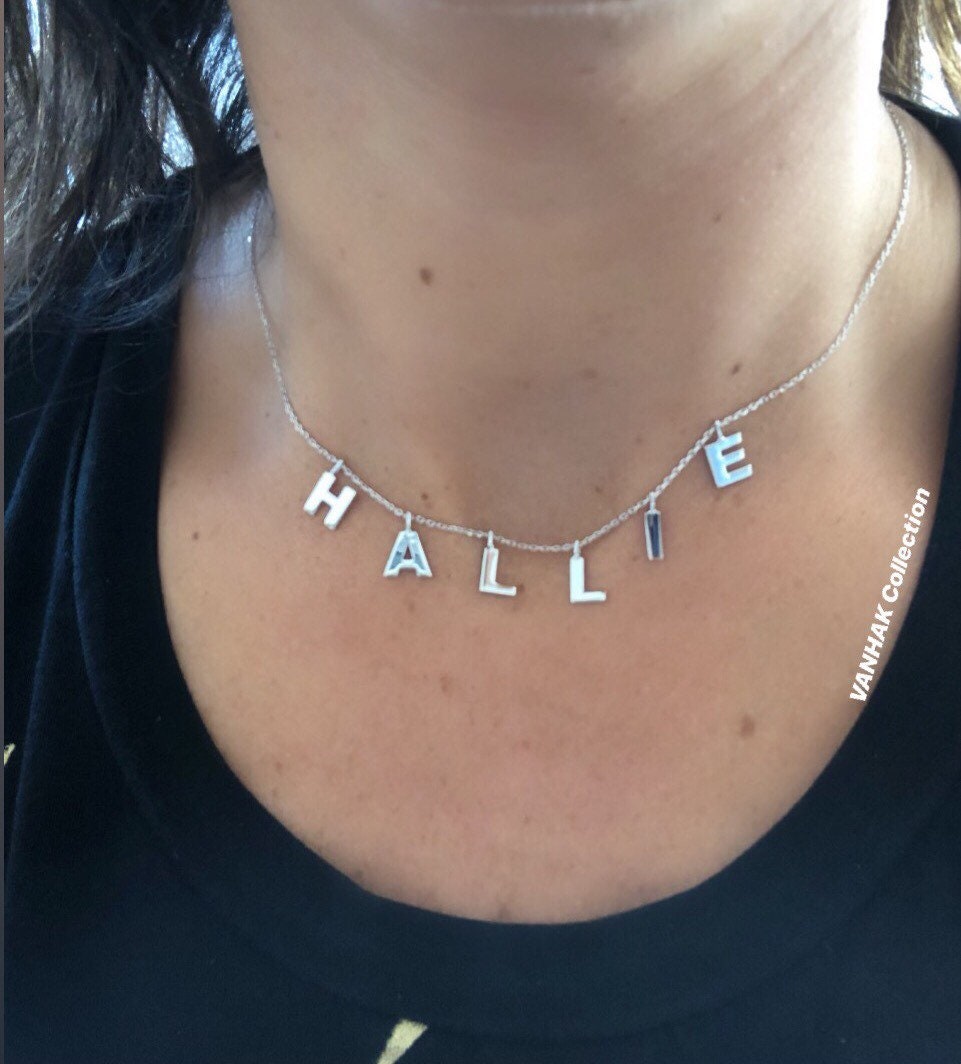 Necklace with shop name spelled out