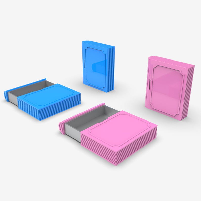 Puede incluir: Una colecci&oacute;n de cajas decorativas azules y rosas. Dos cajas est&aacute;n abiertas, revelando un interior gris. Las cajas cerradas tienen un dise&ntilde;o similar a una puerta. Las cajas est&aacute;n apiladas y tienen un borde detallado.