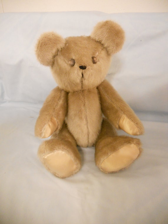 teddy bear with button eyes