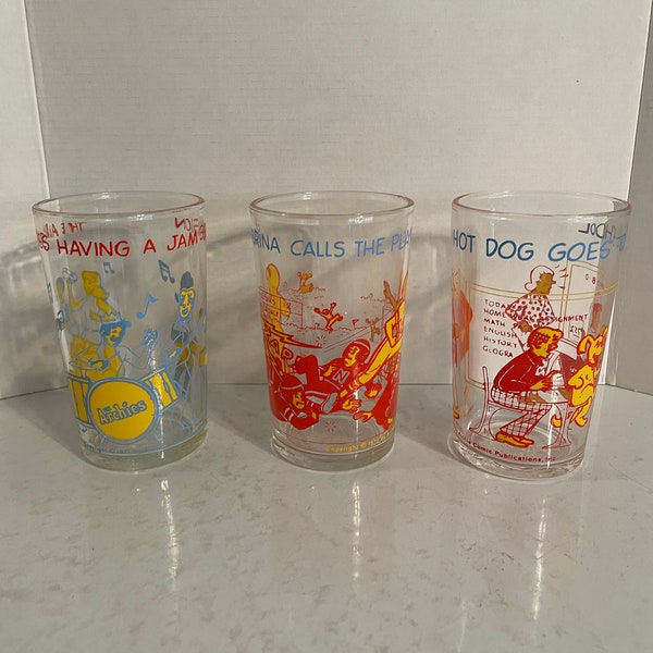 The Archie Comics Set of Three Juice Glasses 4-inch tall Jughead and Betty on the Base All Characters Around the Glass Sides