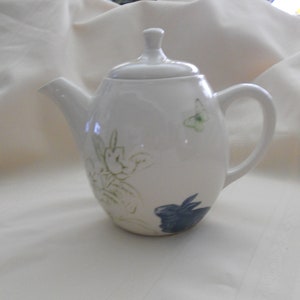 Beautiful White Teapot with Etched Green Floral Blue Bunny & Green Butterfly