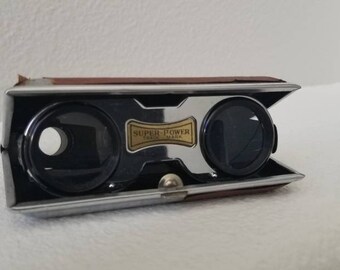 Vintage folding hotsell opera glasses