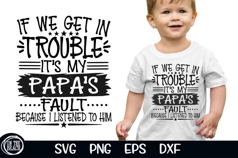 May include: White toddler t-shirt with the text "IF WE GET IN TROUBLE IT'S MY PAPA'S FAULT BECAUSE I LISTENED TO HIM" in black. The shirt is worn by a young child.
