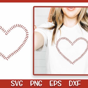 May include: A white t-shirt with a red baseball stitch heart design. The design is a simple heart shape with a baseball stitch pattern around the edge. The shirt is worn by a person with long brown hair.