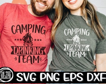 May include: Two red and gray t-shirts with the text "Camping Drinking Team" and a campfire graphic. The text is in black and white. The shirts are on a white background.