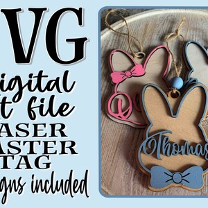 May include: Three laser cut wooden Easter bunny tags with bow ties. The tags are in pink, blue, and natural wood. The tags are labeled "Gwen", "Thomas", and "Dean".