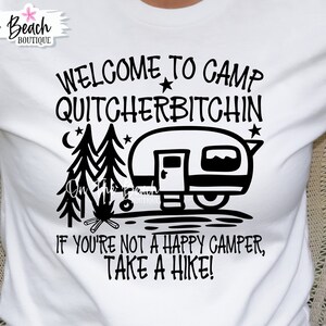 May include: Black and white graphic design featuring a camper van, trees, and a campfire. The text reads "Welcome to Camp Quitcherbitchin" and "If you're not a happy camper, take a hike!"