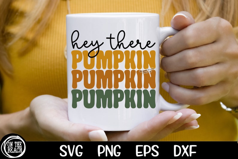 May include: White ceramic mug with the text "hey there pumpkin pumpkin pumpkin" in black, orange, and green lettering.