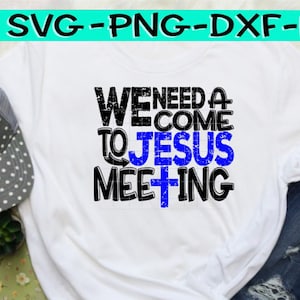May include: White t-shirt with the text "WE NEED A COME TO JESUS MEETING" in black and blue. The shirt is paired with blue jeans and a gray and white polka dot baseball cap. The image also includes a small succulent plant.