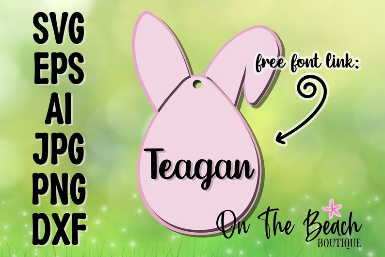 May include: Pink bunny-shaped Easter egg with a hole for hanging. The egg has the name "Teagan" written on it in black cursive font. The text "On The Beach Boutique" is written below the egg in black cursive font.