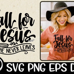 May include: A black and white graphic design with the text "Fall for Jesus He Never Leaves". The design is on a brown t-shirt worn by a person with long blonde hair and a black hat.
