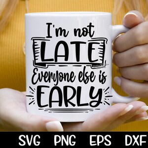 May include: White ceramic mug with black text that reads "I'm not late everyone else is early".