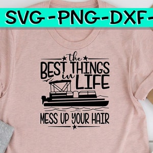 May include: A pink t-shirt with a black graphic design that says "the best things in life mess up your hair" with a silhouette of a pontoon boat.