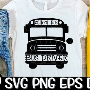 May include: A white t-shirt with a black silhouette of a school bus and the text "School Bus Bus Driver".