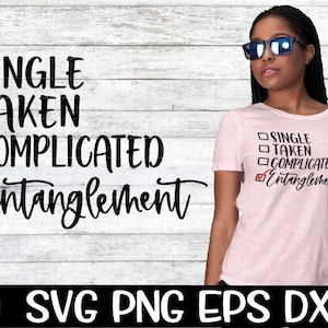 May include: A pink t-shirt with a checklist graphic that says "Single, Taken, Complicated, Entanglement". The word "Entanglement" is checked off.