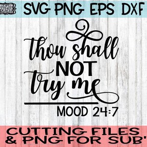 May include: Black and white text graphic with the phrase "Thou shall not try me" and the words "Mood 24:7" below. The graphic is on a white wood background.