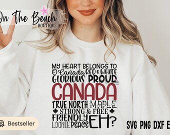 May include: A white sweatshirt with a red and black design that says "My heart belongs to Canada Red & White Glorious Proud Canada True North Maple Strong & Free Friendly Loonie Peace Eh?"  The design also includes a maple leaf.