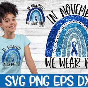 May include: A blue glitter rainbow with a blue ribbon in the center. The text "In November We Wear Blue" is written above and below the rainbow.