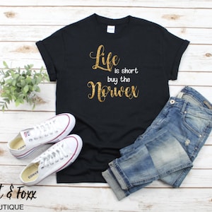 Life is short buy the Norwex black and gold t shirt