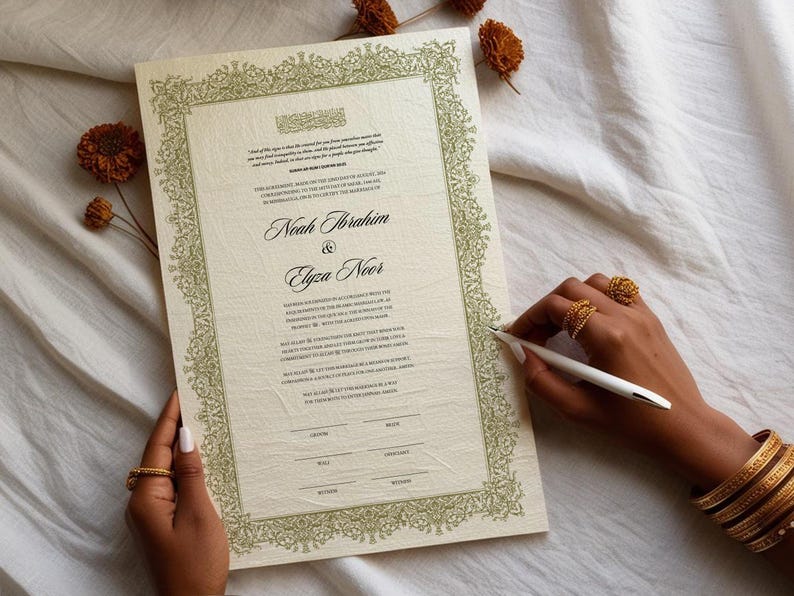 May include: A cream-colored wedding contract featuring an intricate olive green floral border. The document displays the names Noah Ibrahim and Elyza Noor in elegant script, accompanied by printed text and signature lines for the groom, bride, and witnesses.