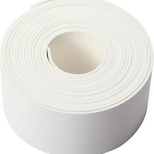 May include: A continuous roll of white adhesive tape featuring a smooth, matte finish. The tape is tightly wound into a circular spool shape, displaying a consistent width and a clean, uniform white color throughout the entire length of the material.