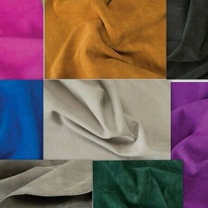 May include: A collection of fabric swatches in various colors, including pink, brown, black, blue, gray, purple, and green. The fabric appears to be suede.