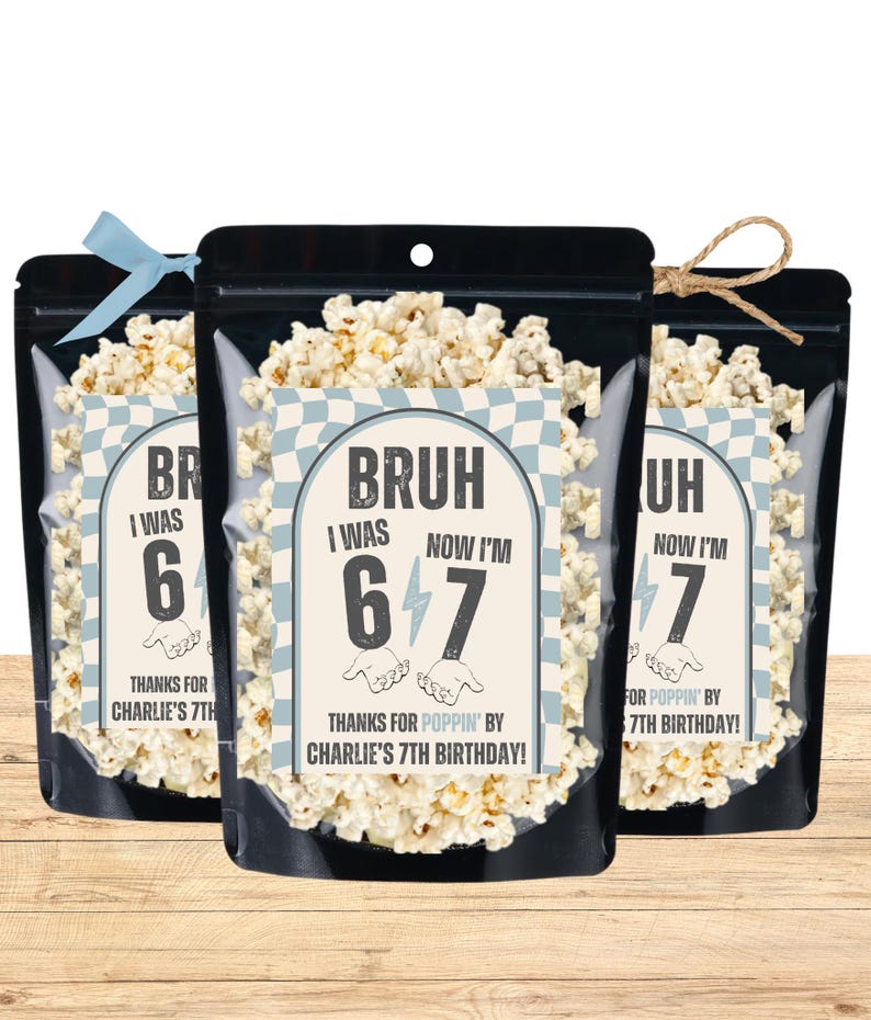 May include: Three black pouches filled with popcorn, each featuring a label with the text "BRUH I WAS 6, NOW I'M 7". The labels have a blue and white checkered pattern and the text "THANKS FOR POPPIN' BY CHARLIE'S 7TH BIRTHDAY!". One pouch has a blue ribbon, another a twine tie.