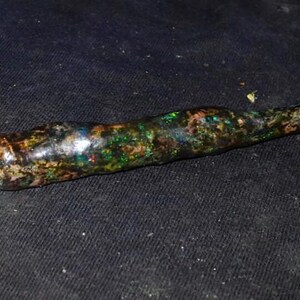 unik piprökning träfossil indonesisk opal
