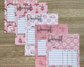 May include: Five pink printable Christmas-themed receipt templates with snowflakes and Christmas trees. The top template has a Santa Claus graphic. The bottom template has columns for item, quantity, price, and total. The text "Thank you so much for your order!" is at the bottom of the template.