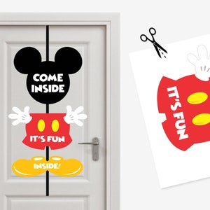 May include: A printable door decoration featuring Mickey Mouse. The decoration is made up of separate pieces that can be cut out and assembled. The pieces include Mickey Mouse's head, ears, hands, shorts, and shoes. The text "Come Inside", "It's Fun", and "Inside!" is included on the decoration.
