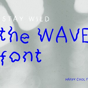 May include: Blue text on a white background reads "STAY WILD the WAVE font" with the word "WAVE" in a wavy font style. Below the text is "HAPPY COOL FONT" in a smaller font size.