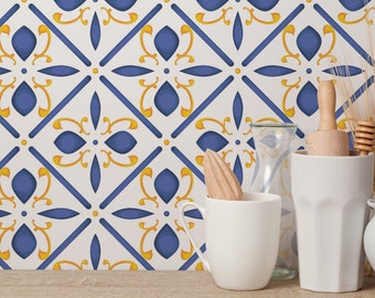 May include: A white ceramic mug, a glass pitcher, a glass jar, a wooden rolling pin, a wooden honey dipper, and a white ceramic creamer are arranged on a wooden shelf in front of a blue and yellow patterned tile wall.
