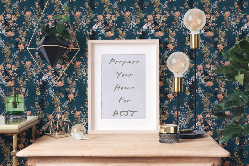 Teal Wildflowers peel and stick wallpaper spreads small blossoms and leafy sprigs in dense repeats on a deep teal wall.