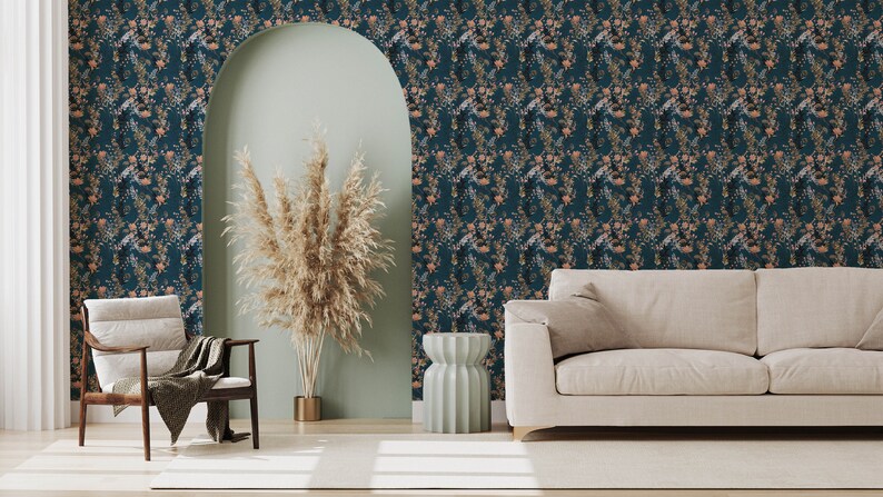 Teal Wildflowers peel and stick wallpaper covers a living room wall with dense peach blossoms and fine leafy sprigs.