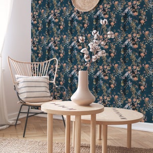 Teal Wildflowers peel and stick wallpaper covers an accent wall with scattered tall sprigs and small blooms on deep teal.