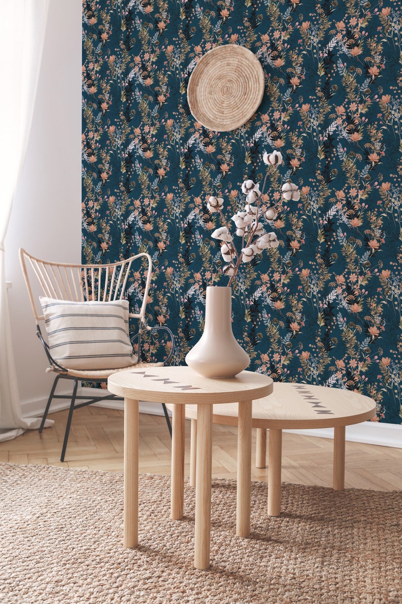 Teal Wildflowers peel and stick wallpaper covers an accent wall with scattered tall sprigs and small blooms on deep teal.