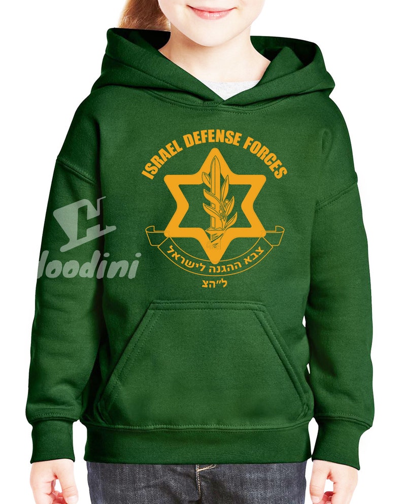 May include: A green hooded sweatshirt with a yellow graphic of the Israel Defense Forces logo. The logo features a Star of David with a sword and olive branches inside. The text "ISRAEL DEFENSE FORCES" is written in a circle around the star.
