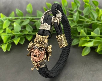 Handgemaakte oni samurai paracord armband – bronzen shogun-kraal