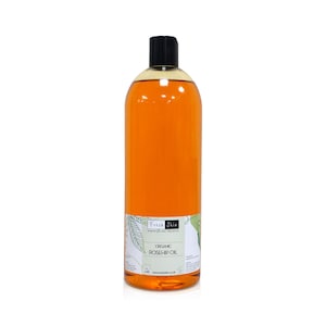 May include: A clear glass bottle with a black cap filled with orange liquid. The bottle has a label that says "Fresh Skin" and "Organic Rosehip Oil".