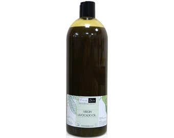 Könnte beinhalten: Eine durchsichtige Glasflasche mit schwarzem Verschluss, gefüllt mit grünem, nativem Avocadoöl. Die Flasche hat ein weißes Etikett mit grünem Text, auf dem "Fresh Skin Virgin Avocado Oil" und eine Website-Adresse stehen.