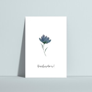 May include: A simple card with a watercolor illustration of a blue flower and the text "Danke sch&ouml;n!"